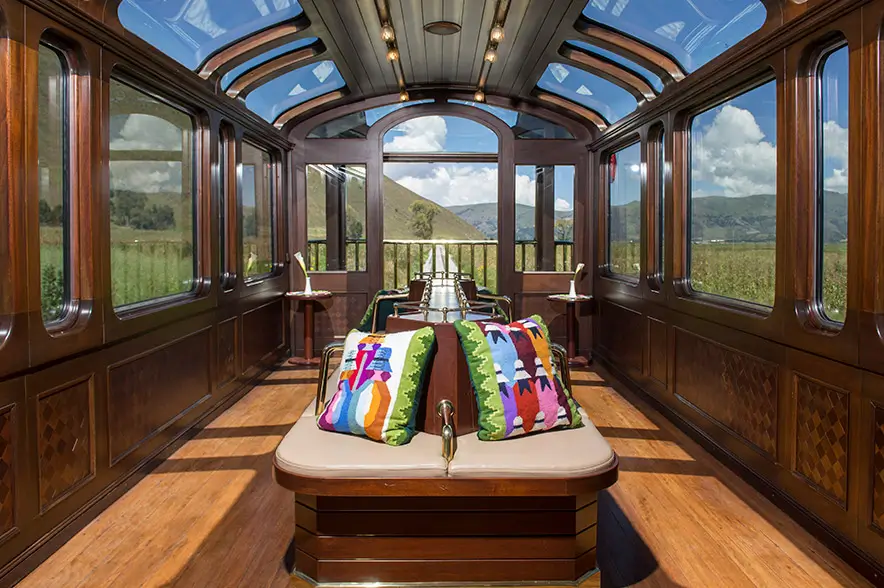 PeruRail Vistadome Observatory train to Machu Picchu with open-air carriage