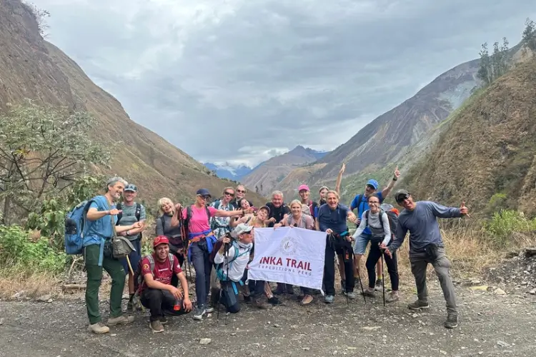 Travelers hiking the ancient Inca Trail to Santa Teresa during the Inka Jungle Trek